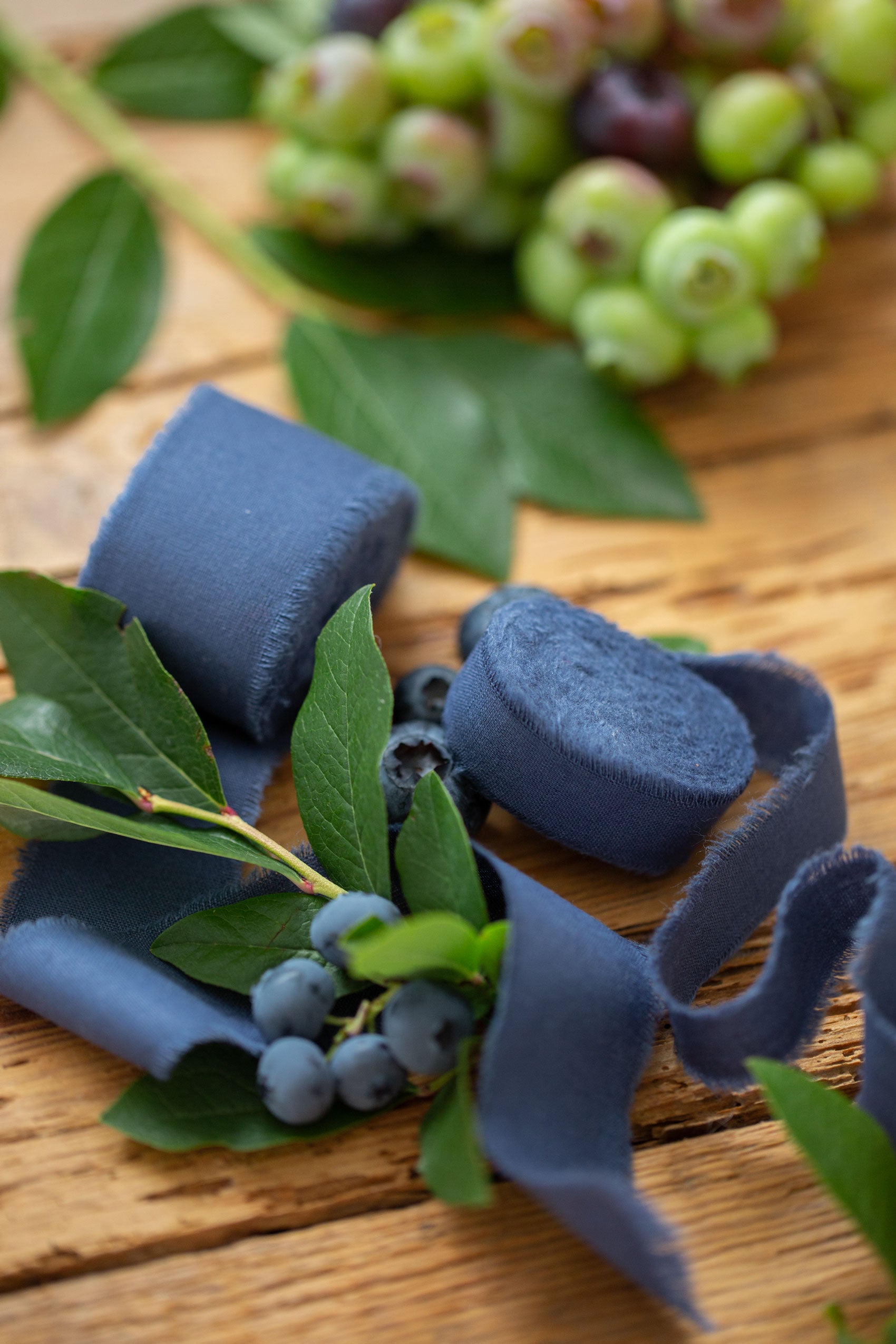 silk ribbon classic blue frayed edges on rustic wedding table